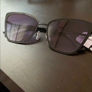 Women’s sunglasses, slight cat eye